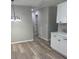 Open floor plan with modern kitchen and bright dining area at 203 Blanche Ave, Belmont, NC 28012