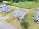 Aerial view of a quaint home and surrounding yard, showcasing its setting and potential at 204 13Th St, Belmont, NC 28012