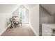 Cozy room in attic with chair by window and natural light at 219 Lee St, Fort Mill, SC 29715