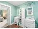 Charming bathroom featuring dual sinks, a white vanity, and stylish fixtures at 219 Lee St, Fort Mill, SC 29715