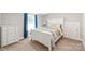 Bright bedroom with white furniture, blue curtains, and large window at 219 Lee St, Fort Mill, SC 29715