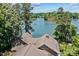 Beautiful waterfront property featuring stunning lake views and mature trees surrounding the home at 230 Shady Cove Rd, Troutman, NC 28166