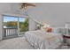 Bedroom has a view of the lake and features a ceiling fan and neutral decor at 230 Shady Cove Rd, Troutman, NC 28166