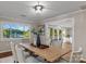 Dining room with a water view and a large wooden table with seating for six at 230 Shady Cove Rd, Troutman, NC 28166
