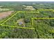 Aerial view of property boundaries surrounded by lush greenery at 230 Shag Bark Ln, Salisbury, NC 28146