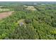 Aerial view of a secluded home nestled within a dense forest at 230 Shag Bark Ln, Salisbury, NC 28146