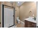 Modern bathroom featuring glass-enclosed shower, tile floor, and updated vanity at 230 Shag Bark Ln, Salisbury, NC 28146
