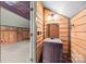 Small bathroom with wood paneled walls and an accent vanity at 230 Shag Bark Ln, Salisbury, NC 28146