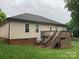 Exterior shot of home with deck, patio, and landscaped backyard at 2339 Wednesbury Ct, Kannapolis, NC 28083