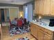 Kitchen with oak cabinets, granite countertops, and breakfast nook at 2339 Wednesbury Ct, Kannapolis, NC 28083