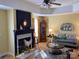 Cozy living room with a fireplace and an elegant decor, featuring an inviting seating area at 2339 Wednesbury Ct, Kannapolis, NC 28083