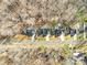 Aerial view of several homes on a wooded street, highlighting their location and surrounding landscape at 242 Delview Dr, Cherryville, NC 28021