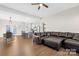 Open-concept living room with a kitchen island, hardwood floors, and an open layout at 242 Delview Dr, Cherryville, NC 28021