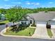 Charming single-story home featuring a lush front yard, driveway, and attached garage in a well-maintained community at 28129 Song Sparrow Ln, Fort Mill, SC 29707