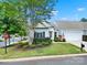 Charming home with landscaped front yard, mature tree, and attached garage, offering curb appeal and convenience at 28129 Song Sparrow Ln, Fort Mill, SC 29707