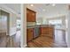 Kitchen features wood cabinets, stainless dishwasher and an open concept at 28129 Song Sparrow Ln, Fort Mill, SC 29707
