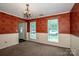 A dining room featuring neutral carpeting and windows offering ample natural light at 292 Rose St, Mooresville, NC 28117