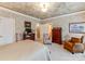 Bright bedroom with sitting area, neutral carpet and walls, and ensuite bathroom at 3044 Luke Crossing Dr, Charlotte, NC 28226