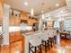 Spacious kitchen boasts granite countertops, stainless appliances, and a breakfast bar at 3044 Luke Crossing Dr, Charlotte, NC 28226