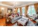 Inviting living room with hardwood floors, large windows, and modern decor at 3044 Luke Crossing Dr, Charlotte, NC 28226