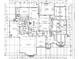 Detailed first floor plan with kitchen, primary suite, garage, and other rooms with dimensions at 306 Sugar Maple Ln, Matthews, NC 28104