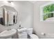 Half bathroom featuring a pedestal sink and window view to the home's exterior at 3218 Gilroy Dr, Fort Mill, SC 29707