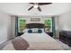 Primary bedroom with ceiling fan and natural light at 3218 Gilroy Dr, Fort Mill, SC 29707