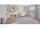 Charming bedroom featuring playful wall art, a twin bed, and a bright window at 3218 Gilroy Dr, Fort Mill, SC 29707