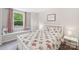 Bright bedroom with window seat, botanical-themed bedding, and soft natural light at 3218 Gilroy Dr, Fort Mill, SC 29707