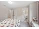 Bright bedroom featuring a cozy window seat, ensuite bathroom, and neutral color palette at 3218 Gilroy Dr, Fort Mill, SC 29707