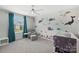 Bright Bedroom showcasing a crib, glider, and colorful sea-themed wall decor at 3218 Gilroy Dr, Fort Mill, SC 29707