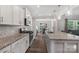 Modern kitchen features granite countertops, stainless steel appliances, and ample cabinet space at 3218 Gilroy Dr, Fort Mill, SC 29707