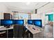 Spacious office with multiple monitors and views into the backyard at 3218 Gilroy Dr, Fort Mill, SC 29707