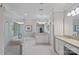 Serene bathroom with glass shower, separate tub, dual sinks and vanity, plus ample natural light at 3524 Rhett Butler Pl, Charlotte, NC 28270