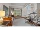Open living space with hardwood floors, high ceilings, and an abundance of natural light at 3524 Rhett Butler Pl, Charlotte, NC 28270