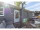 Backyard deck with stylish patio furniture, BBQ, and open backyard space at 386 Greenlea Cir, Taylorsville, NC 28681