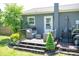 Cozy backyard deck with patio furniture, gas BBQ, and inviting backyard view at 386 Greenlea Cir, Taylorsville, NC 28681