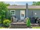 Backyard patio area with stylish furniture, grill, and green surroundings at 386 Greenlea Cir, Taylorsville, NC 28681