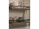 Bathroom floating shelves feature wooden planks, black metal brackets, and decorative accents at 386 Greenlea Cir, Taylorsville, NC 28681