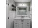 Bathroom featuring vanity with marble countertop and framed mirror at 386 Greenlea Cir, Taylorsville, NC 28681