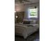 The cozy bedroom offers comfortable bedding, natural light, and stylish decor, providing a peaceful retreat at 386 Greenlea Cir, Taylorsville, NC 28681