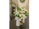 Dining table with floral centerpiece at 386 Greenlea Cir, Taylorsville, NC 28681