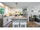 Bright, open kitchen featuring granite countertops, an island, and stainless steel appliances at 386 Greenlea Cir, Taylorsville, NC 28681