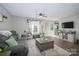 Bright living room area with neutral walls, modern furniture, and decor providing a welcoming atmosphere at 386 Greenlea Cir, Taylorsville, NC 28681