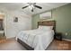 Bedroom with a ceiling fan, closet and large bed at 392 Tall Oaks Trl, Fort Mill, SC 29715