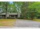 Beautiful single-Gathering home exterior surrounded by lush trees at 392 Tall Oaks Trl, Fort Mill, SC 29715