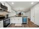 Updated kitchen with island, granite countertops, and stainless steel appliances at 392 Tall Oaks Trl, Fort Mill, SC 29715