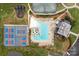 Aerial view of community amenities, including pools, tennis courts, basketball courts, and meticulously maintained landscaping at 400 Maymont Dr, Cramerton, NC 28032