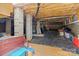 Unfinished basement providing ample storage space and potential for customization to suit various needs and preferences at 400 Maymont Dr, Cramerton, NC 28032
