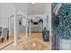 Elegant foyer showcasing soaring ceilings, decorative columns, and a view into the living space at 400 Maymont Dr, Cramerton, NC 28032